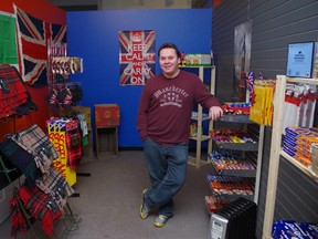 Greg Smith stands in his shop.