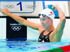 Stratford's Julia Wilkinson reacts after her women's 100m freestyle heat at the London 2012 Olympic Games. (Reuters)