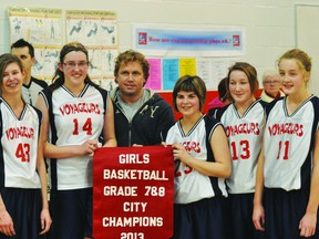 Left to right: Kass Cunningham, Calista Sainsbury, LVS phys.ed teacher Mark Sokolowski, Maddie Lambert, Kylee Nelson, and Jill Jackson hold the city championship banner. (Kevin Hirschfield/Portage Daily Graphic/QMI AGENCY)