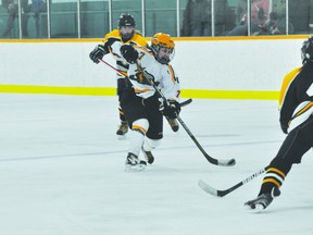 Saints forward Aprel Assiniboine takes a shot during Thursday's game against Fort Richmond. (Kevin Hirschfield/PORTAGE DAILY GRAPHIC/QMI AGENCY)