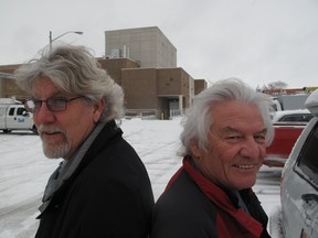 Retired firefighter Jim Brodie, left, and retired OPP officer Bob Higgins are looking a little shaggy these days as they grow their hair to see who will have the longest ponytail. They are doing it as a fundraiser for the local Ontario Society for the Prevention of Cruelty to Animals. They welcome any donations people want to make to the cause. Photo taken Monday, Feb. 11, 2013 in Chatham, Ont.
ELLWOOD SHREVE/ THE CHATHAM DAILY NEWS/ QMI AGENCY