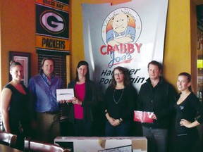 Pictured from left to right: Crabby Joe’s employee Melissa Brodie, owner Ian Cumming, i Pad winner Donna Little of Port Elgin, TV winner Sharon Ross of Port Elgin, winner of a night out including a limo, dinner and casino vouchers, Trevor Smith of Port Elgin and Crabby Joe's employee, Lauren Johnson. Absent from the photo are winners Mike Holmes and Steve Currie.