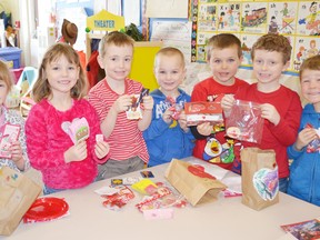 Pictured holding up their Valentine’s Day treats (left to right) are Meghan McNabb, Brooklyn Banks, Liam Doherty, Bryce MacLean, Emmett Jackson, Jacob Drummond and Parker Kaake.