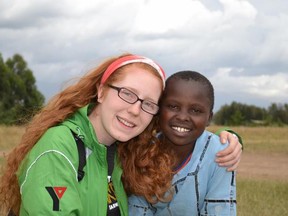 Project Kenya member Loralyn Blondin poses for a final picture at their Tigithi camp. The group of youth and adult volunteers are now climbing Mount Kenya, the second largest mountain in Africa. They will attempt to reach the mountain's summit early Saturday. SUBMITTED PHOTO / THE OBSERVER/ QMI AGENCY