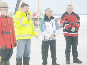 The Alberta Pond Hockey Championships got underway in Lac Cardinal outside of Peace River on Friday February 15. Pictured, Dave Allan, second from left, the Alberta Pond Hockey Championship President, makes welcomes Cpl SHane Himmelman (left), from the Peace Regional RCMP, Hector Goudreau (middle) LA for Dunvegan- Central Peace-Notley and Peace River MLA Frank Oberle (right) during the opening ceremonies on Friday afternoon. 32 teams from the Peace Country and from as far as Edmonton are taking part. The championship game takes place at 3 p.m. on Sunday (Feb.17).  The winning team receives an entry into the World Pond Hockey Championships and $2,000 for travel costs.