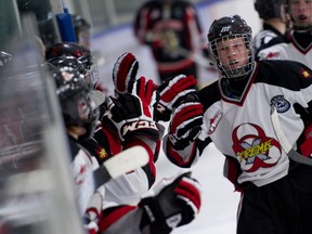 Airdrie, Alta. � AMBHL Game 1 Playoff Action between the Airdrie Xtreme (white) and Red Deer Black at the Ron Ebbesen Arena on Thursday, February, 14 2013. 

JAMES EMERY/AIRDRIE ECHO/QMI AGENCY