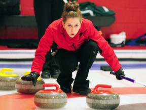 Fanshawe skip Jordan Ariss instructs her sweepers Friday as the Falcons defeated the Fleming Knights 10-1 for their third win and a guaranteed spot in Sunday's playoffs at the Ontario Colleges Athletic Association curling championships. (R. MARK BUTTERWICK, St. Thomas Times-Journal)