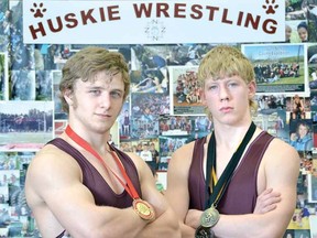 Stratford Northwestern Huskies wrestlers Clayton Pye, left, and Jamie Steckly have enjoyed impressive seasons, including a gold for Pye at the recent Ontario Juvenile Championships at Brock University. (SCOTT WISHART, The Beacon Herald)