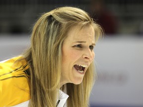 Team Manitoba skip Jennifer Jones  yells instructions to her sweepers as her team competes in the Scotties Tournament of Hearts in Kingston at the K-Rock Centre on Saturday  February 16 2013. DANIELLE VANDENBRINK/Kingston Whig-Standard/QMI Agency