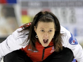 Team Canada skip Heather Nedohin yells instructions to her sweepers as they compete in the Scotties Tournament of Hearts in Kingston at the K-Rock Centre on Sunday.