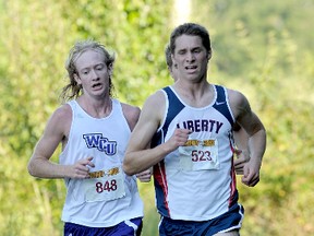 Jeremie Bourget, right, set a personal best in the 5,000-metre race at the Penn State University Challenge Cup race earlier this month, finished less than three seconds behind the winner.