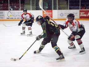 St. Thomas Stars forward Drew Collinson evades two Predators during the second period of Sunday's home game against visiting Lambton Shores. The Stars won 3-2 on a goal by forward Mike Iacocca with just over a minute left in the game. (Nick Lypaczewski, Times-Journal)