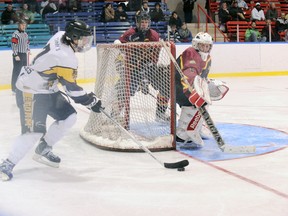 DANIEL R. PEARCE  Simcoe Reformer

Clayton Chalmers of the Simcoe Storm moves from behind the New Hamburg net during his team’s 5-1 playoff loss to the Firebirds at Talbot Gardens on Sunday night.
