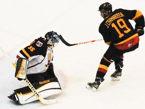 Belleville Bulls forward Joseph Cramarossa scores on a third-period penalty shot against Barrie Colts goalie Mathias Niederberger during OHL action Monday afternoon at Yardmen Arena. (Luke Hendry/The Intelligencer.)