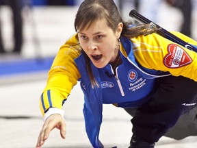 Team Alberta skip Kristie Moore lets her rock go during the 2013 Scotties Tournament of Hearts. (Photo courtesy Andrew Klaver Photography)