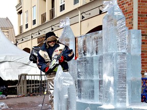 KARA WILSON, for The Expositor

Jean-Pierre Gauthier uses a chainsaw to sculpt details of an ice castle during Frosty Fest at Harmony Square.