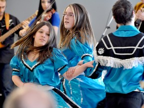 Clarise klassen/Portage Daily Graphic
Prairie Métis Steppers Sasha Thorsteinson, left, Calista Sainsbury and Kalem McLennan danced through a series of intricate steps during a performance at the Louis Riel Day festivities at the PCU Centre Monday. Large crowds turned out for the event despite blizzard-like conditions, to take in the demonstration’s of the Métis people’s pride in their culture.