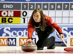 Team Ontario skip Rachel Homan shoots a rock as they compete against British Columbia in the Scotties Tournament of Hearts in Kingston at the K-Rock Centre on Monday. (IAN MACALPINE The Whig-Standard)