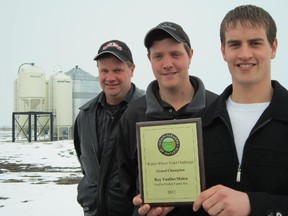 The finest crop of wheat grown in Ontario in 2012 was produced by the VanDerMolen family of Jarvis. Their 50-acre winter wheat crop on Walpole Concession 8 yielded out at 144 bushels to the acre. From left is Ray VanDerMolen and sons Dennis and Aaron. (MONTE SONNENBERG QMI Agency)