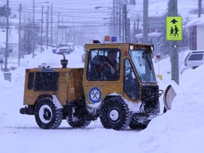 City of Timmins has apologized for snowy sidewalks saying it was not able to run its full fleet of sidewalk plows on Tuesday.  Timmins Times LOCAL NEWS photo by Len Gillis.