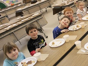 These young Sacred Heart Catholic School students are all smiles as they enjoy pancakes smothered in sweet maple syrup as part of Shrove Tuesday. After their bellies were filled they returned to their respective classes and began their studies on Lent. 

Photo by Dawn Lalonde/Mid-North Monitor/QMI Agency