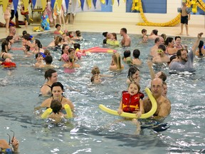 Tillsonburg's sponsored free public swim at the Tillsonburg Community Centre filled the Kinsmen Pool, which reached its limit of 256 people on Monday afternoon. CHRIS ABBOTT/TILLSONBURG NEWS/QMI AGENCY