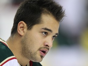 Wild forward Devin Setoguchi skates during the warmup prior to facing the Flames at the Scotiabank Saddledome in Calgary, Alta., Nov. 8, 2011. (AL CHAREST/QMI Agency)