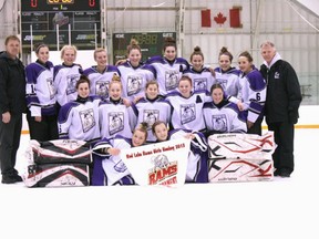 The Beaver Brae girls' hockey team holds up their Champions banner in Red Lake. The girls won the tournament with a perfect 5-0 record.
KELLY ALCOCK/Beaver Brae Broncos