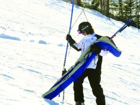 Laurin Hummelbrunner sets up some racing gates at Mount Evergreen on Saturday, Feb. 16. Hummelbrunner is one of the people trying to get a downhill racing team back in Kenora.
GRACE PROTOPAPAS/Daily Miner and News