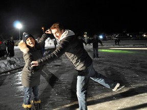 Today reporter Jordan Thompson practices with Olympic gold medal-winning figure skater Jamie Salé before his figure skating lesson Friday night. VINCENT MCDERMOTT/TODAY STAFF