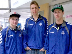 Left to right, Nate Breitkreuz, Jacob Flett and Ryan Larson, wearing their Alberta Team Handball Federation jackets, stopped for a photo at the FMHS office on Feb. 13.