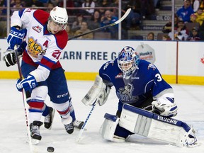 With the Oil Kings down 2-0, Travis Ewanyk corrals a puck in front of Victoria Royals’ goalie Coleman Vollrath and tucks it five-hole to start a five-goal comeback at Rexall Place on Sunday, February 17, 2013. Edmonton won the WHL game, 5-2. AMBER BRACKEN/Edmonton Sun