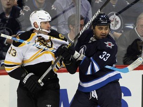 Dustin Byfuglien is big enough to handle defencemen like Zdeno Chara in front of the net, so he could get more time up front on the power play