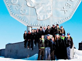 The Saugeen Maitland Midget AA Lightning pose in front of the big
nickel in Sudbury between the annual Snowflake Challenge Tournament games on the Feb. 15 weekend.