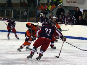 Flyers’ #91 Khalin Marsolais takes the puck through the Dawson Creek defensive lineup for a goal attempt during the Feb. 15 game - the first in a best-of-five series in the NWJHL series.