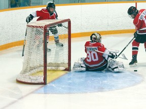 Peewee Thistles’ goalie Cooper Hatfield makes the save on a Lorette shot from the corner. Kenora won their first playoff game against th Comets 3-2.
GRACE PROTOPAPAS/Daily Miner and News