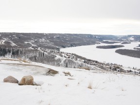 Erin Steele/R-G
The view from the 12 Foot Davis Gravesite as seen on Saturday, Feb. 16. The gravesite itself is at the far left of the photograph beside the people. The frozen rivers are the conflux of the Peace River and the Smoky river. This is a popular tourist attraction for its historical as well scenic value.