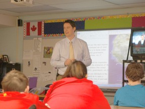 Erin Steele/R-G
Patrick McLean, Glenmary Vice Principal and social studies teacher, addresses the students between during a TakingABGlobal video conference where students were able to interact with an ex-child soldier from Sierra Leone.