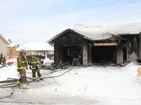 A Val Therese home was heavily damaged by fire on Urbandale Wednesday morning. JOHN LAPPA/THE SUDBURY STAR/QMI AGENCY