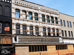 Demolition was proceeding on 327 and 329 Talbot St. - at one time the home of Percy Spackman Motors - last May. The structure is being demolished for construction of office space on Talbot and a commercial building off Curtis Street. (File photo)