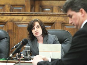 Alderman Patricia MacQuarrie questions Randy Plant after making a presentation on behalf of the Wetaskiwin and District Chamber of Commerce during city council’s regular meeting Feb. 11. Sarah O. Swenson/ Wetaskiwin Times photo