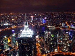 The city of Shanghai, population 23 million, viewed from the 101-storey Shanghai World Financial Centre. By the end of this century, economist Paul Romer argues, giant cities like Shanghai with populations greater than 10 million will be the centres of power and influence.