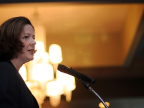 Alberta Premier Alison Redford addresses the crowd at the Growing the North dinner gala Wednesday at the Pomeroy Inn and Conference Centre. Although a projected $3.5 to $4 billion deficit is expected to hit the province's budget, Redford is maintaining that booming centres such as Grande Prairie are still a priority for the government. ADAM JACKSON/DAILY HERALD-TRIBUNE