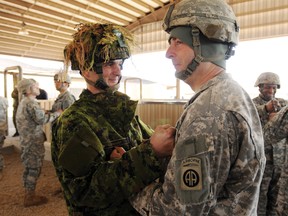 In this 2012 photo, paratroopers with Mike Company, 3rd Battalion, 3rd Royal Canadian Regiment integrated with their American counterparts of 2nd Battalion, 505th Parachute Infantry Regiment, 3rd Brigade Combat Team to conduct a Joint Operations Access Exercise at Fort Bragg. Over the next two weeks, Petawawa soldiers will once more work with the 82nd Airborne. For more community photos please visit our website photo gallery at www.thedailyobserver.ca.