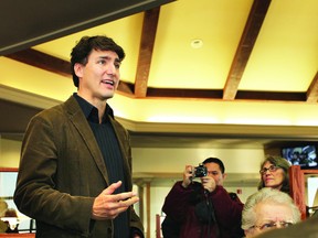 Liberal leadership candidate Justin Trudeau encouraged Canadians to put aside differences, pull together, and get involved with politics, during a quick campaign stop at the Denny's Restaurant in Napanee last Thursday morning.