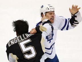 The Leafs' Colton Orr in a recent scrap with the Penguins' Deryk Engelland. (Reuters)