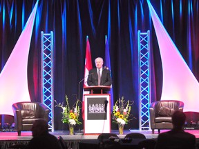 Minister of Energy Ken Hughes speaks to the crowd gathered at the Growing the North Conference held at the TEC Centre at Evergreen Park on Wednesday and Thursday. (Aaron Hinks/Daily Herald-Tribune)