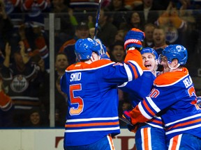 Ryan Smyth celebrates his second-period goal against the Wild with his teammates Thursday at Rexall Place. (Amber Bracken, Edmonton Sun)