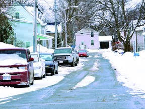 Parked cars lining the south side of Emma Street will have to be moved elsewhere if city council approves a proposed no-parking zone for the street on Tuesday. DARCY CHEEK The Recorder and Times