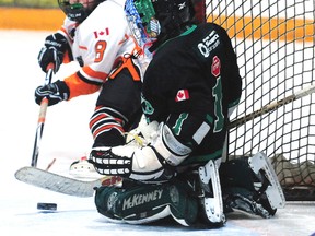 St. Thomas Jr. Stars goalie Matthew Verbrugge makes the save on Essex Raven Konner McDermott in tyke action Friday at the Timken Centre. The Ravens won the St. Thomas Tyke/Novice Classic game 4-0 on goals by Charlie Paquette, Kohen Fuerth, Cameron Derksen and Emmit Paquette.  R. MARK BUTTERWICK / St. Thomas Times-Journal / QMI AGENCY